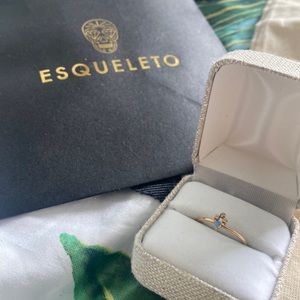 Three diamond and opal gold ring